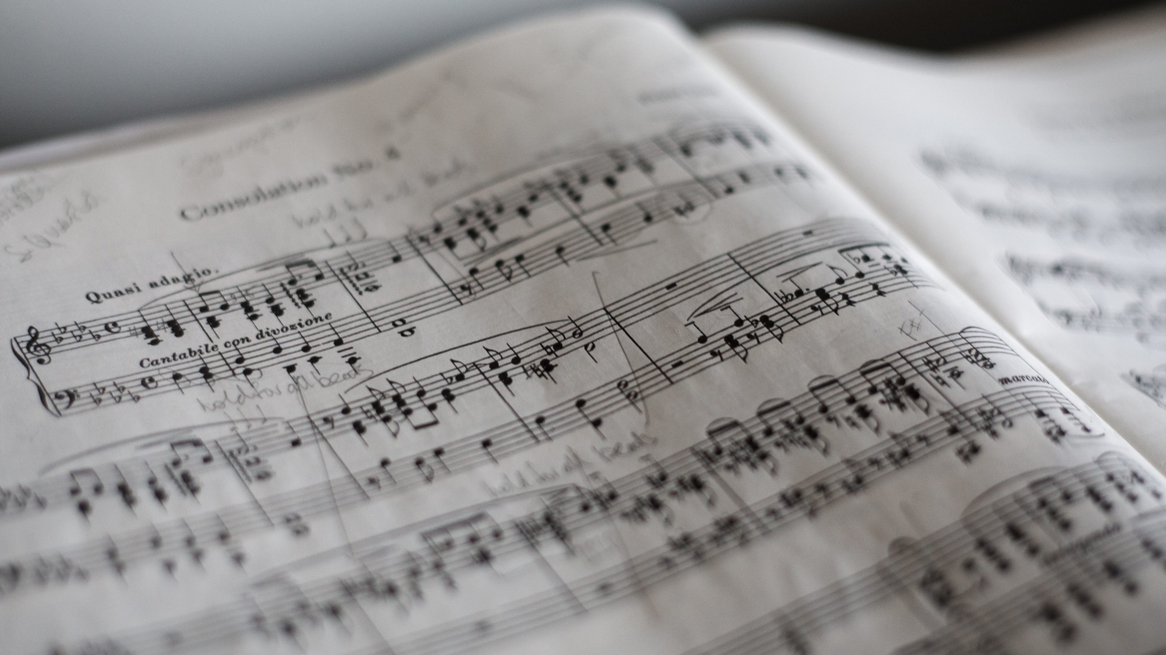 Sheet music up close illustrating how we can hear music from protein chains