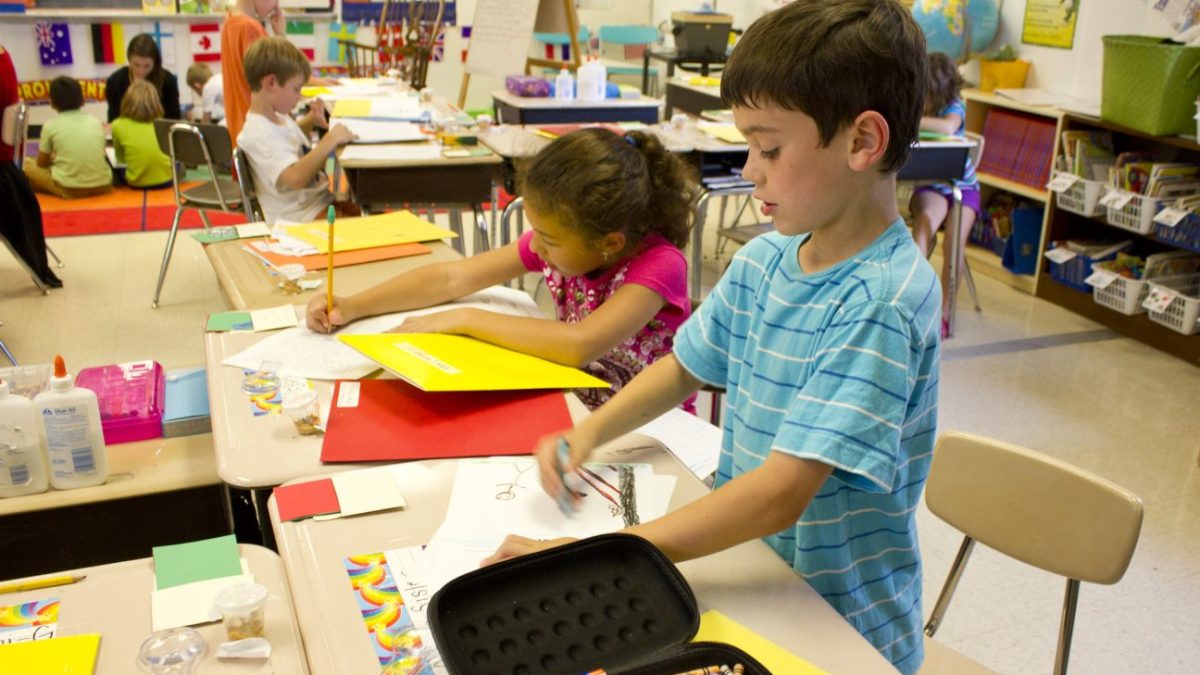 Two second graders learn by different approaches. One draws a picture, the other writes a paragraph.
