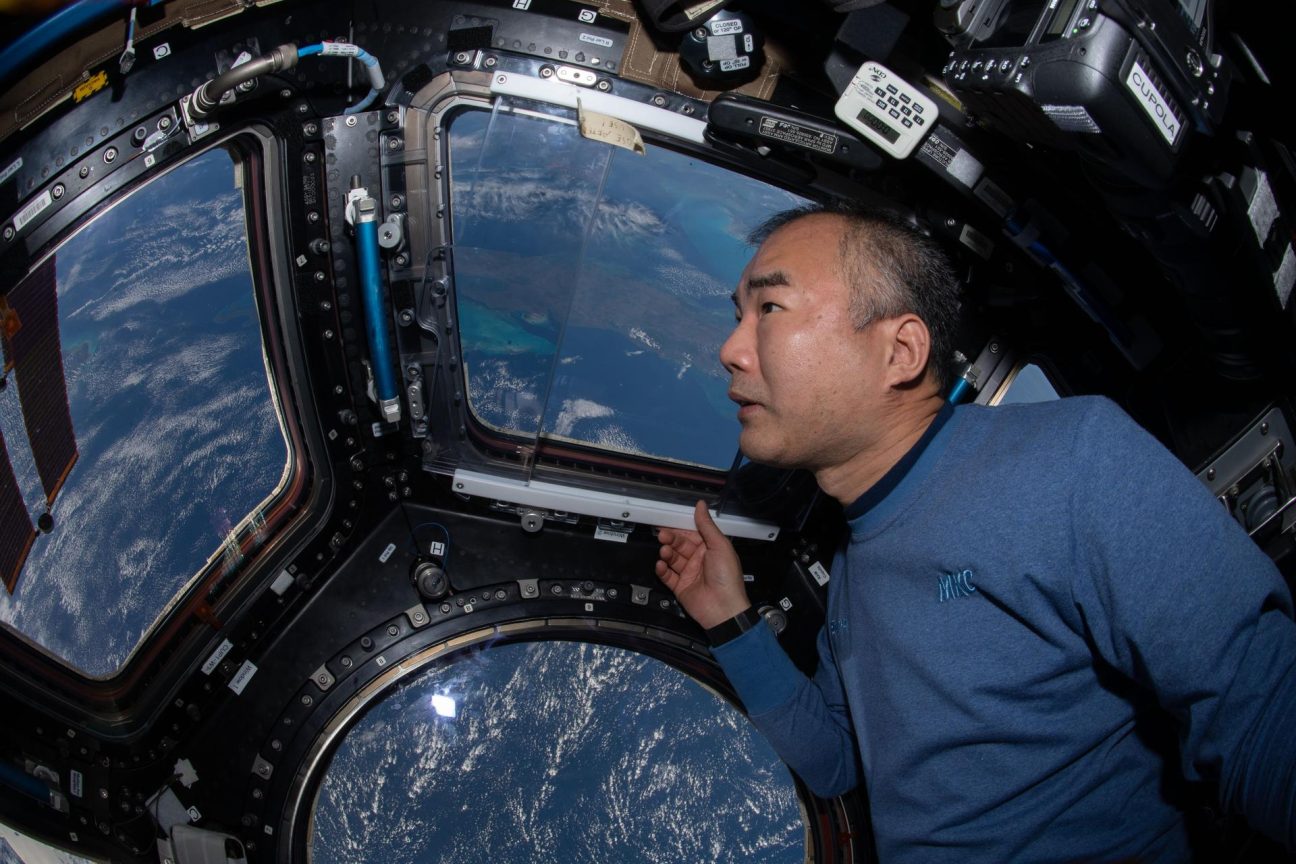 JAXA astronaut Soichi Noguchi views the Earth from the International Space Station's cupola.