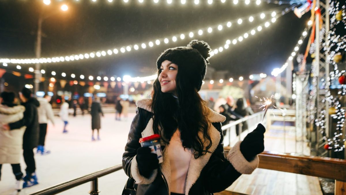 A happy girl celebrates Christmas in Finland