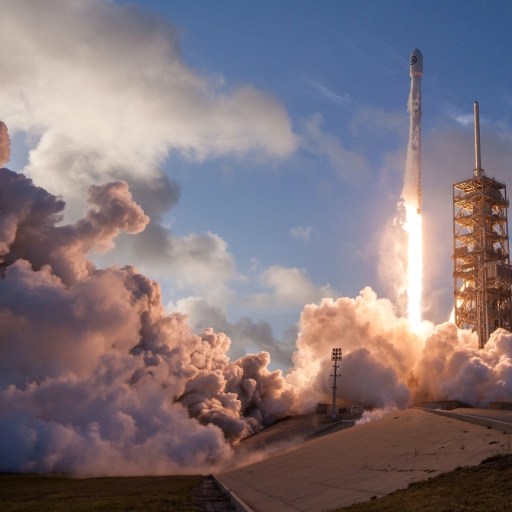A rocket launching into space.