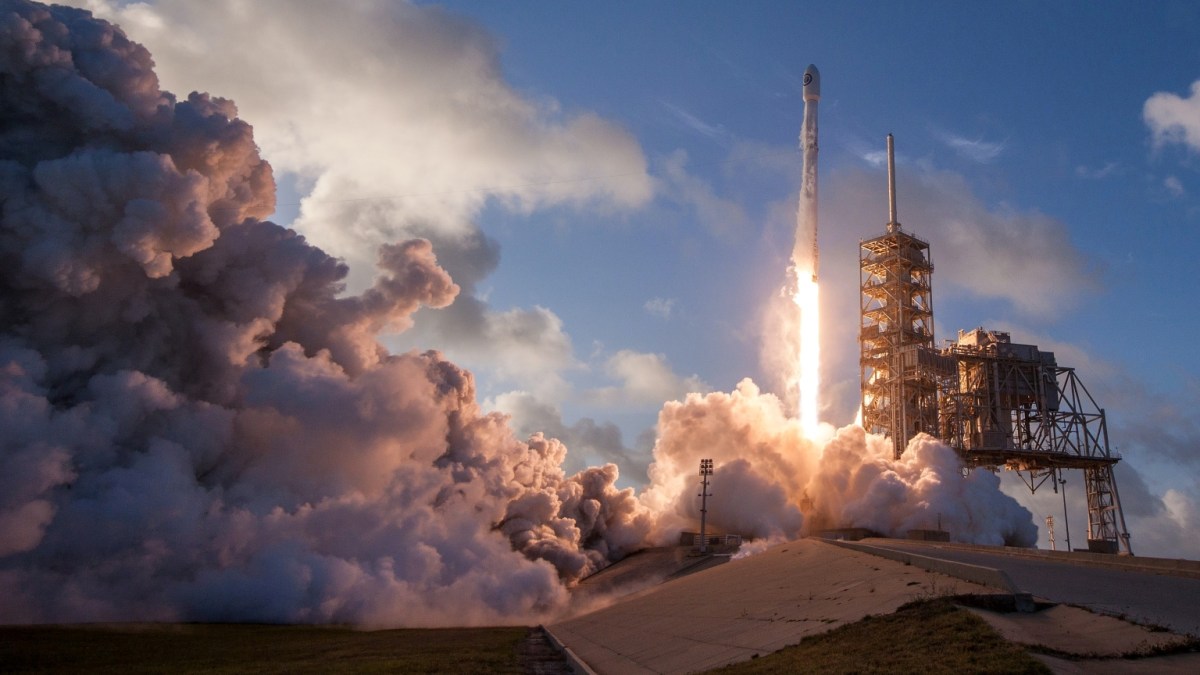 A rocket launching into space.