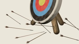 A target with several arrows on the ground nearby and none hitting the bullseye, capturing the joy of being wrong.