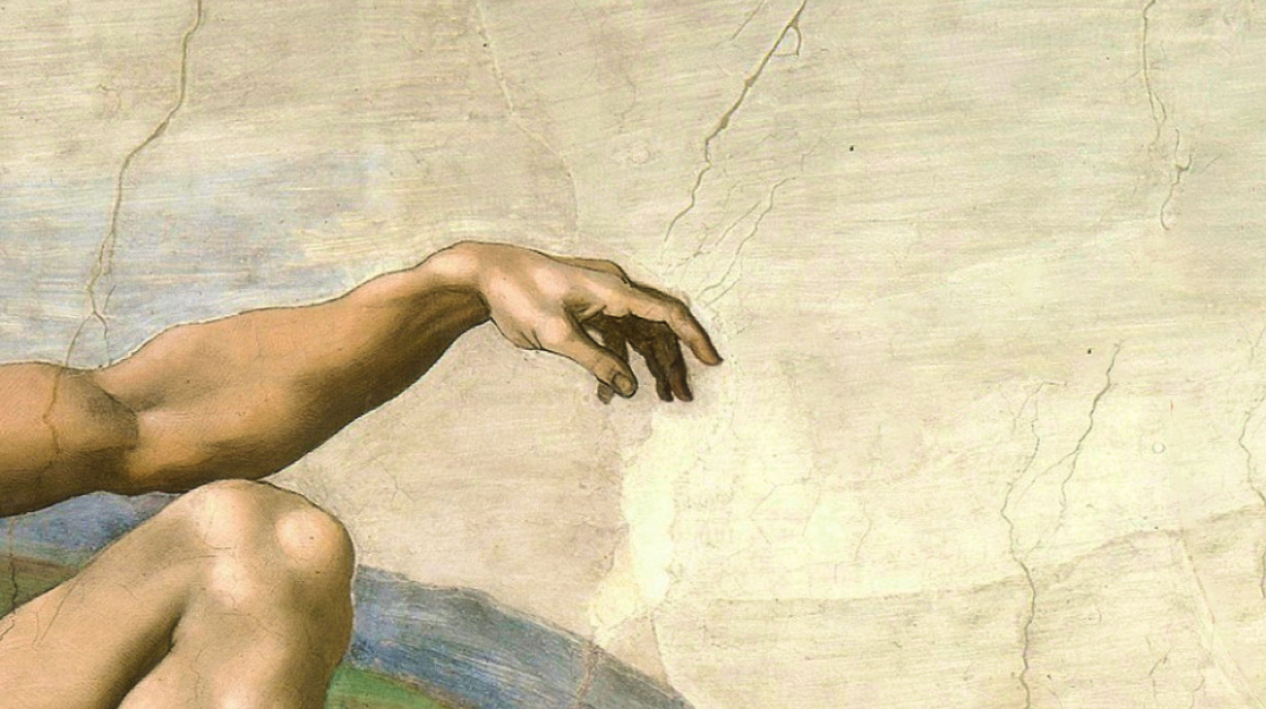 A close-up of a painted human arm and hand reaching out with extended fingers against a light, cracked background.