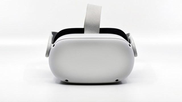 A white virtual reality headset on a white background.