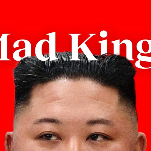 the cover of a magazine with a picture of a man's face.