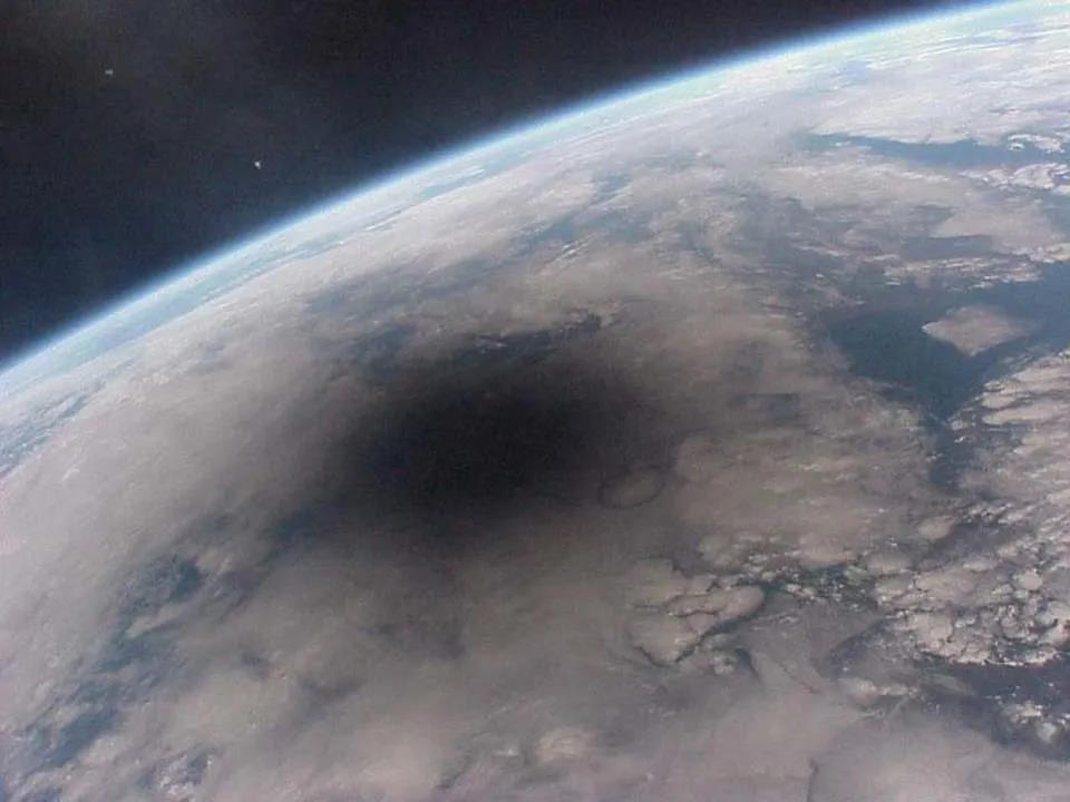 a black hole in the middle of the earth.