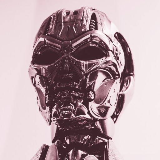 a close up of a robot head on a white background.