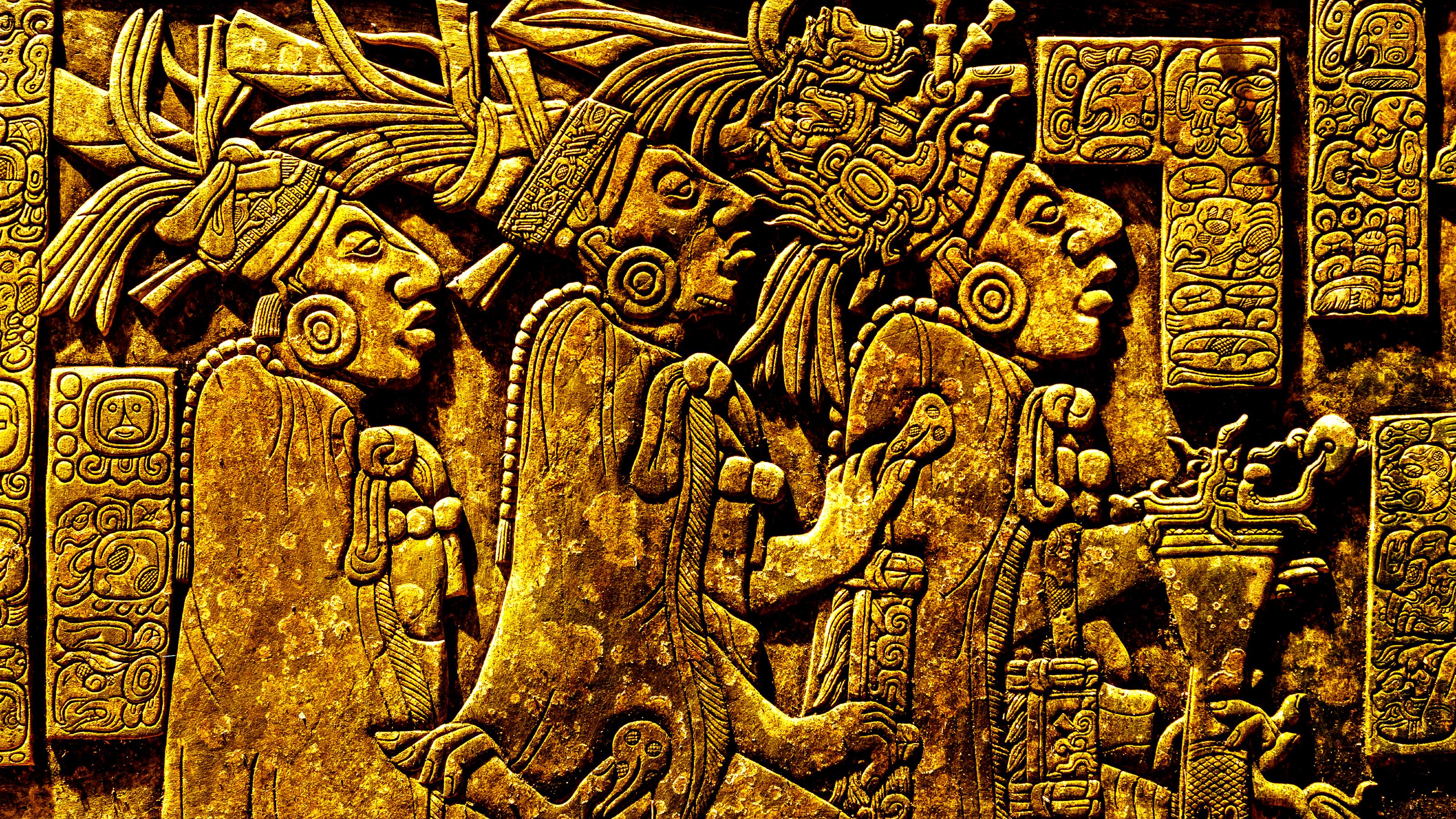 a close up of a carving on a wall.
