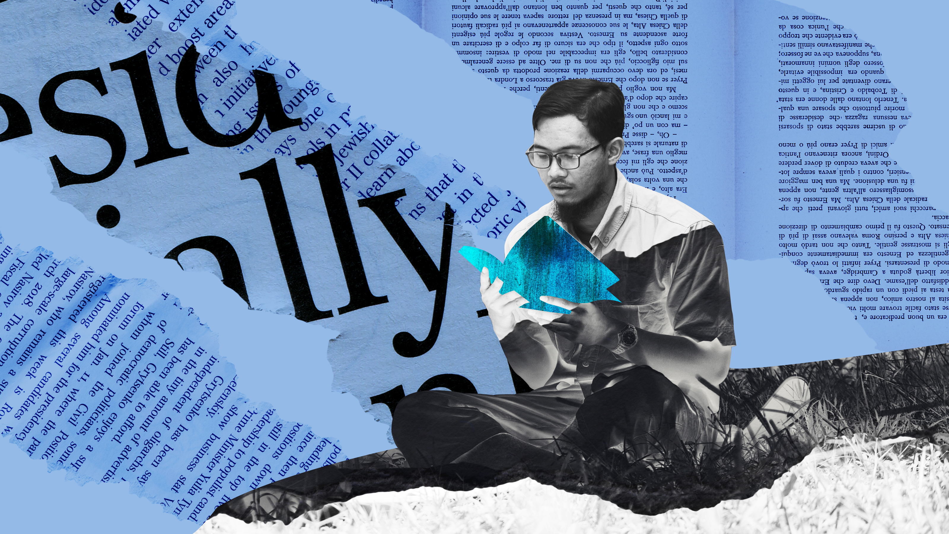 a man sitting on top of a pile of paper.