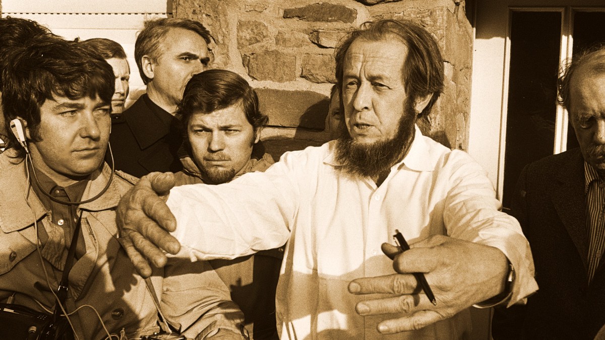 a group of men standing next to each other.