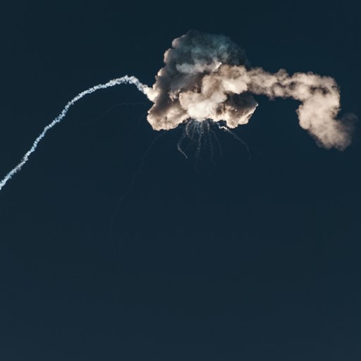 a jet is flying through the air with smoke coming out of it.