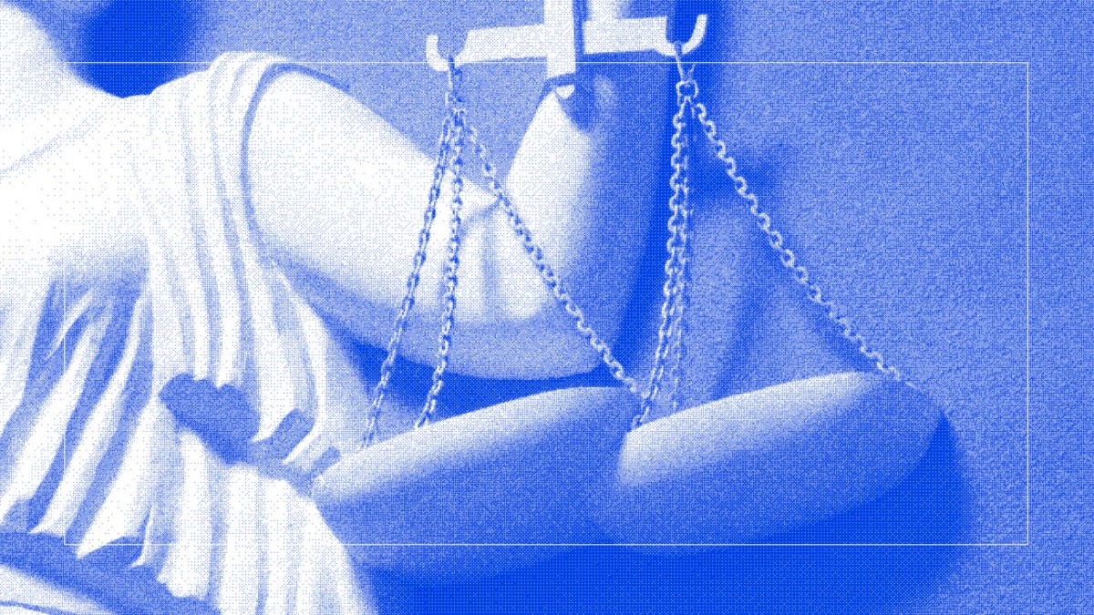 A statue of justice holding scales on a blue background.