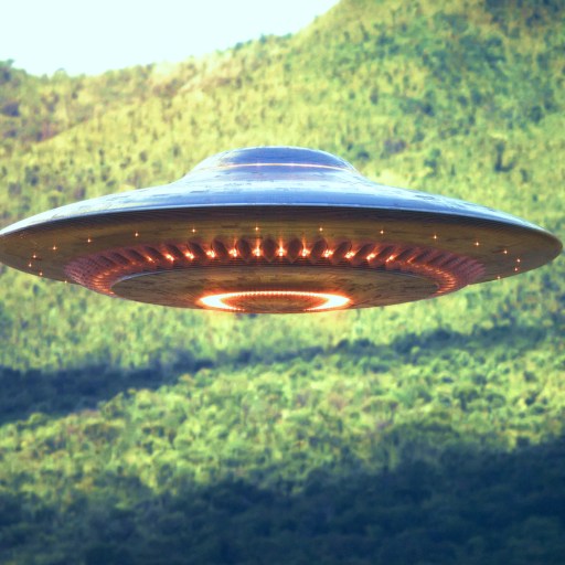 An ufo flying over a forest.