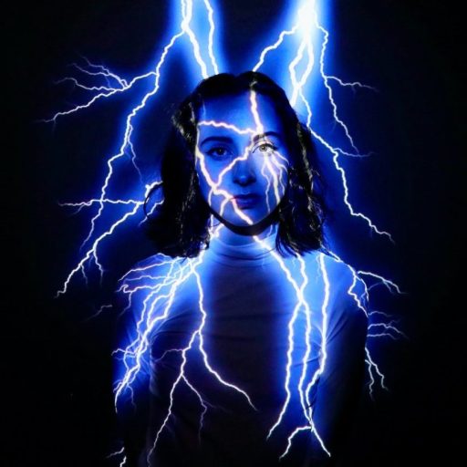 A woman with a blue lightning bolt in her face.