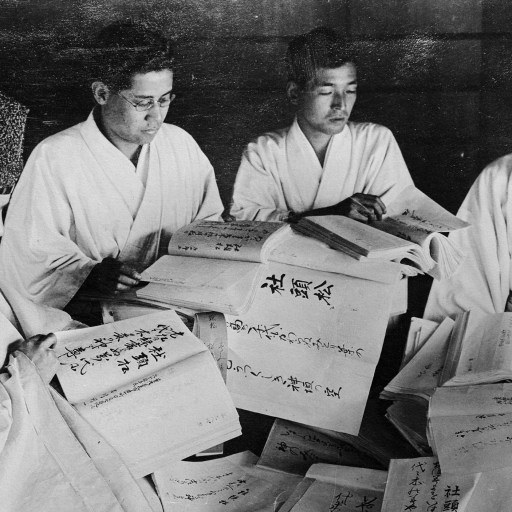A group of men studying Japanese philosophy.