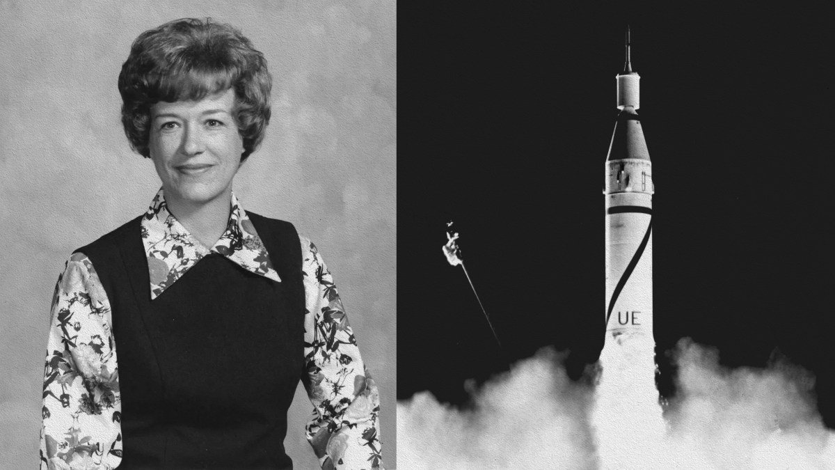 Keywords: Joyce Neighbors

Description: A black and white photo featuring Joyce Neighbors standing proudly next to a rocket.
