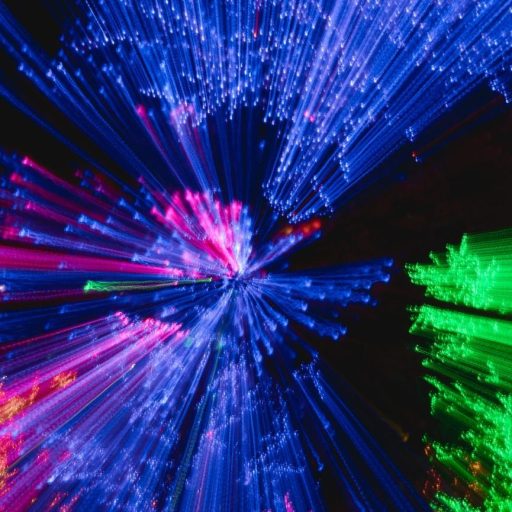 An image of colorful lights in the dark.