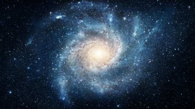 An image of a spiral galaxy in space.