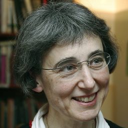 A woman wearing a sweater.