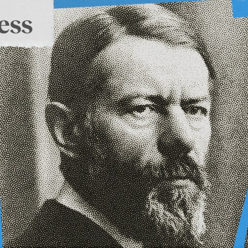 A man with a beard embodying the Protestant work ethic.