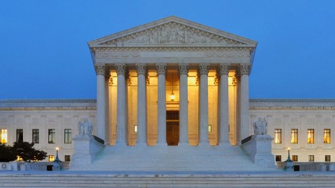 The United States Supreme Court building, a neoclassical structure with tall columns.