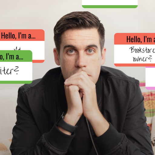 A person sits pensively with name tags around them reading "Hello, I'm a... writer? bookstore owner? father?.