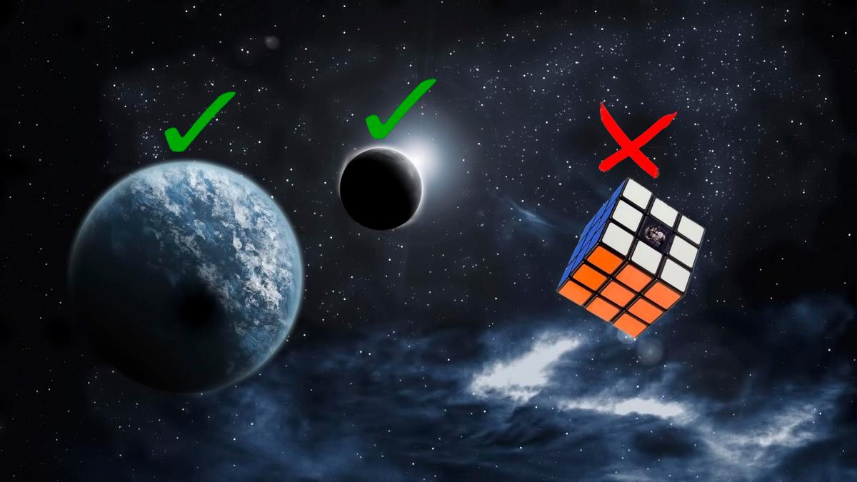 A Rubik's cube with a red X floats in space, next to a planet and moon—each marked with green checkmarks—that boast their perfect round shape.