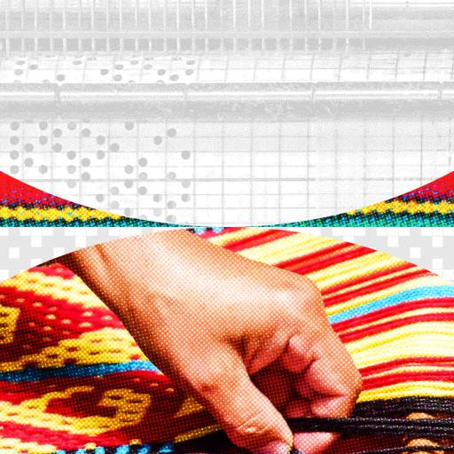 A weaver's resilient hand skillfully crafts vibrant, geometric patterns into the woven fabric.