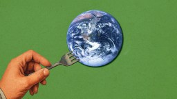 A hand holding a fork is positioned toward a photo of Earth against a green background.