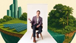 A man in a suit sits on a chair against a white backdrop, with illustrated green skyscrapers, solar panels, and trees in the background.