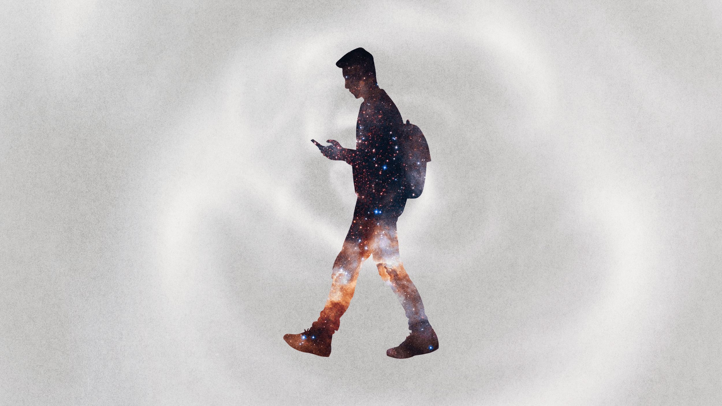 Silhouette of a person with a backpack looking at a phone or book, filled with a galaxy pattern, on a light, swirling background.