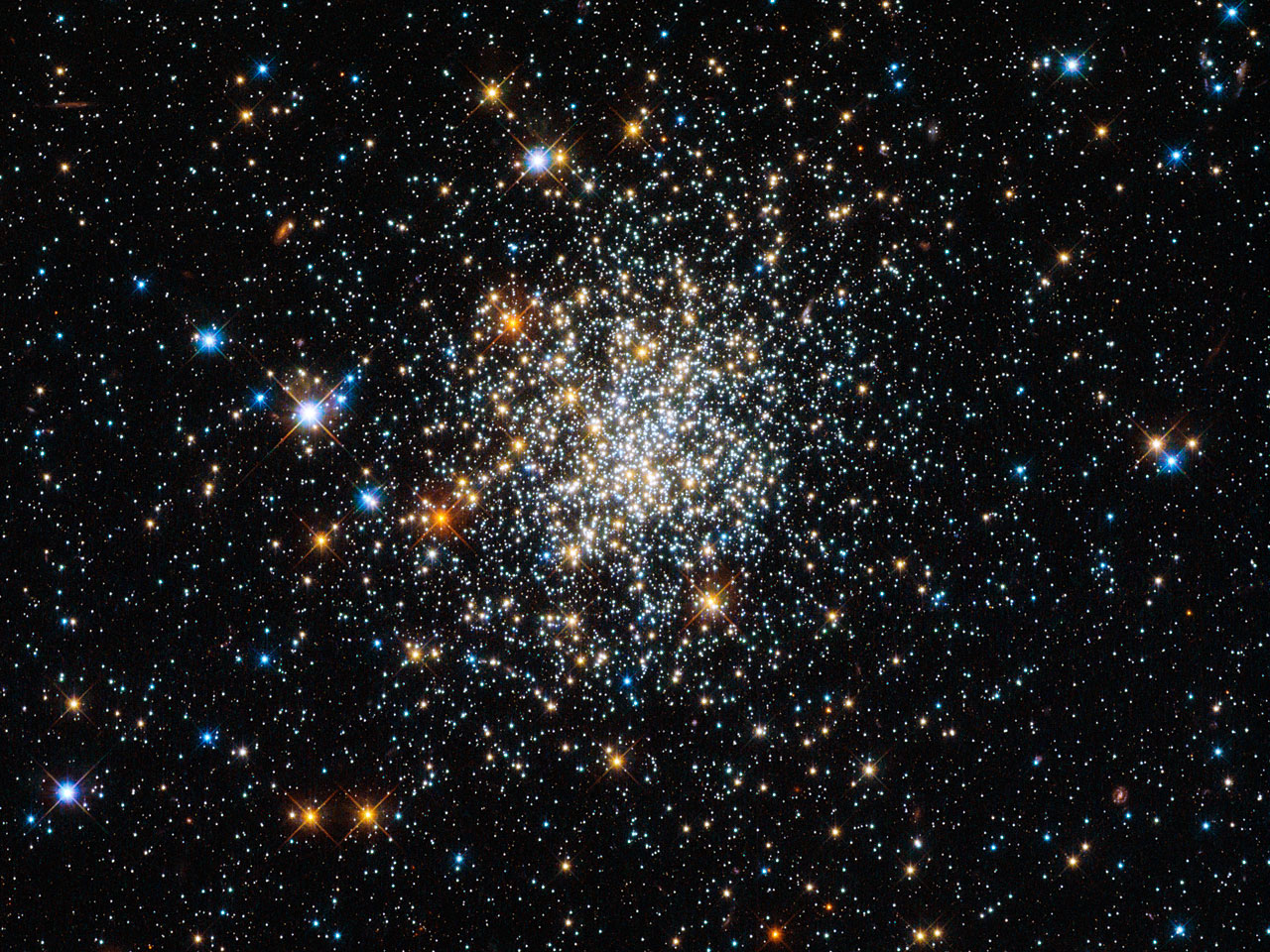 A dense cluster of stars creates a stunning space appearance, with bright and dim points of light that could deceive the eye against the vast dark background.