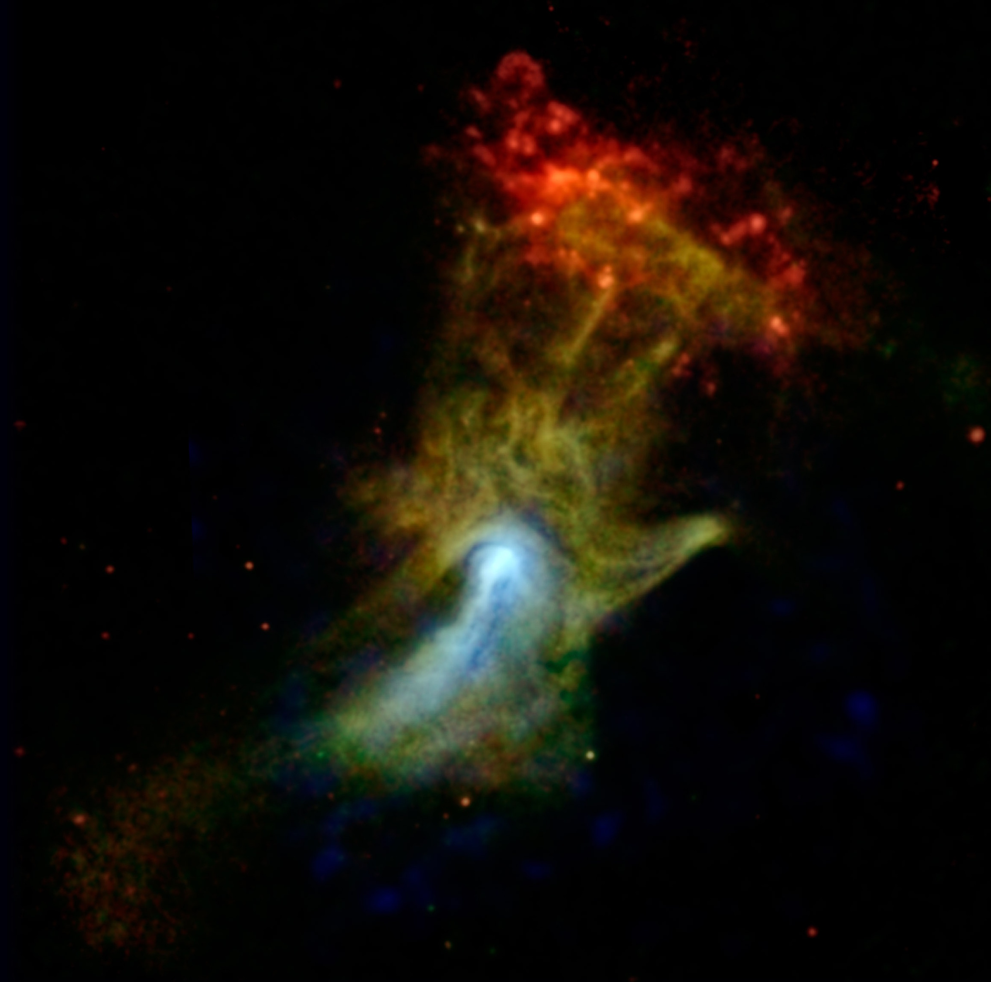 A colorful nebula in space forms a cloud resembling an outstretched hand, with red, yellow, green, and blue hues against a black backdrop—a stunning scene where space appearance can truly deceive the eye.