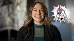 A woman smiling at camera.