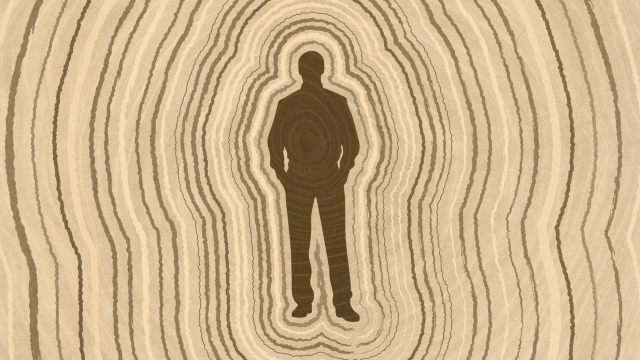 Silhouette of a person standing with hands in pockets, surrounded by concentric oval lines resembling tree rings that symbolize lifespan, in various shades of brown.
