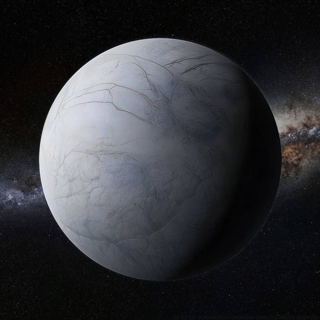 A grey, icy planet or moon with surface cracks is shown against a backdrop of stars and the Milky Way galaxy.