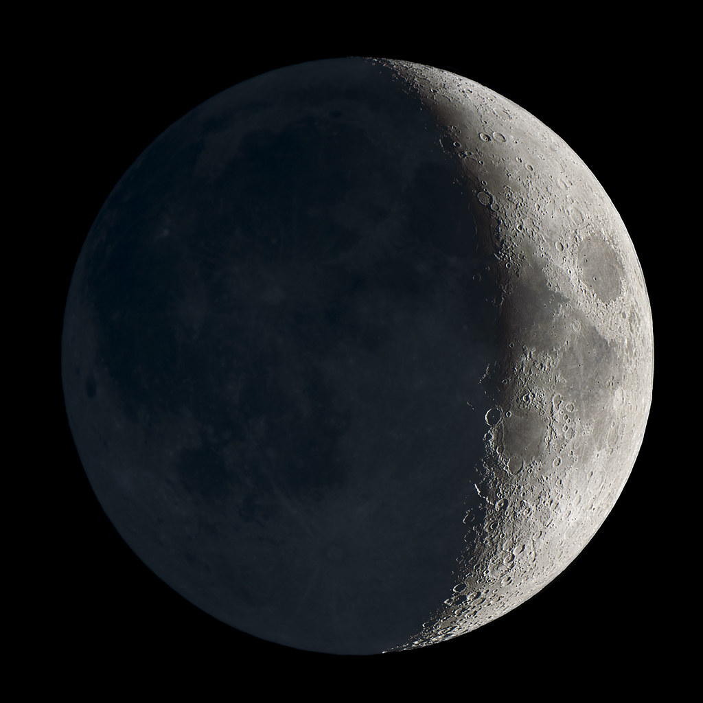 A detailed image of the moon in its first quarter phase, perfect for 5 science lessons—showing half its surface illuminated and visible craters along the shadow line.
