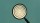 A magnifying glass focusing on concentric circles against a plain teal background.