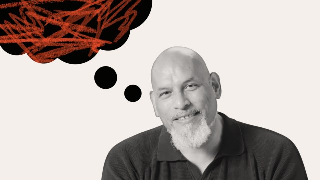 A man with a bald head and gray goatee smiles at the camera. Above his head, a thought bubble filled with red scribbles hints at the inner thoughts of John Amaechi.