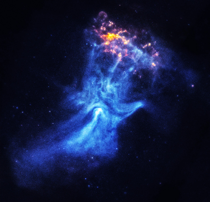 A nebula in space appears as a blue cloud with bright orange and yellow accents at the top, carved by a dead star into what’s known as the “Hand of God,” surrounded by scattered stars on a dark background.