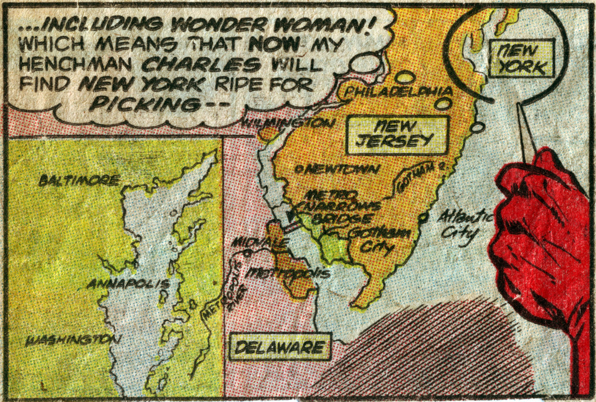 A comic book panel shows a gloved hand pointing to a map of New York, New Jersey, Delaware, and surrounding areas, with text referencing Wonder Woman and plans for New York.