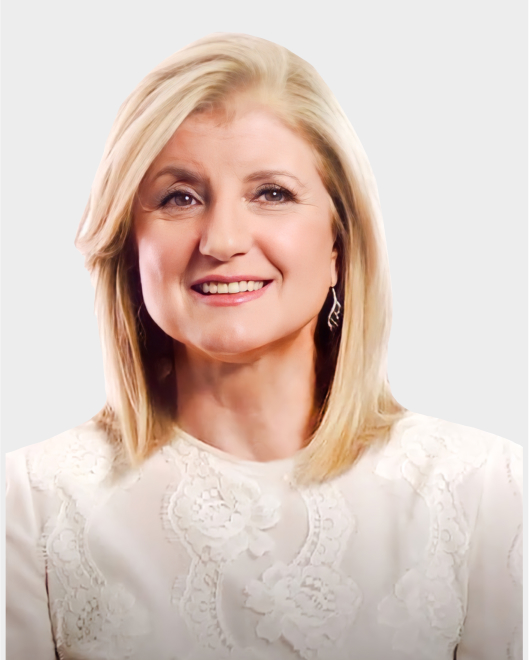 A woman with shoulder-length blonde hair, wearing a white lace top, smiles at the camera against a plain light background.